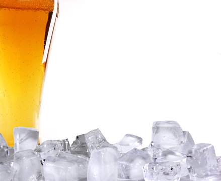 Beer glass with ice cubes