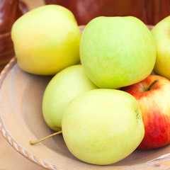 apple in a ceramic bowl at the fair