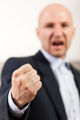 Screaming angry men fist