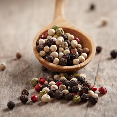 pepper in wooden spoon