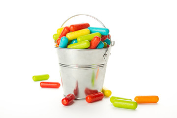 Colored candy in the bucket