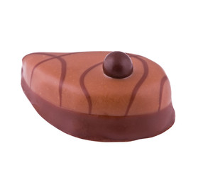 Chocolate decorated with a cream on the white