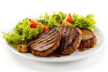 Grilled steaks and vegetables