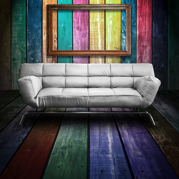 White leather sofa in Colorful Wood Room and old wood fotoframe