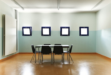 empty room with one table and chairs
