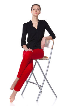 Young Confident Business Woman Sitting On The Stool