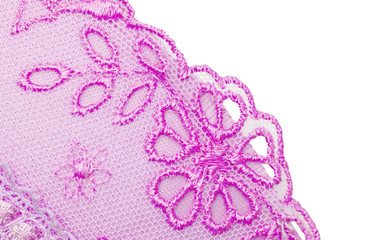 The embroidered laces on linen, on the white background