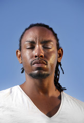 Young athletic man taking a break