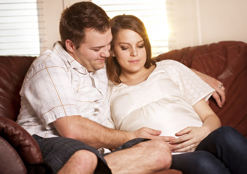 Young Expecting Parents portrait at home