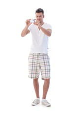 Young man with digital camera