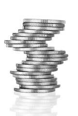 Unstable stack of silver coins