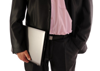 Businessman holding laptop- front view