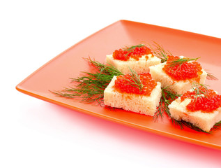 Red caviar and bread isolated on white