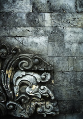 brick wall with stone carving