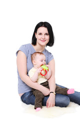 Fototapeta premium Mum holds on hands of the baby.