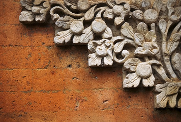 brick wall with stone carving