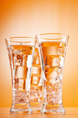 Water in the glass against gradient background