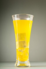 Colourful cocktail in glasses with ice