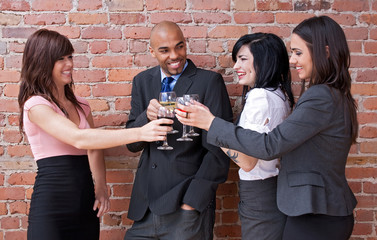 Young people drinking wine and having fun