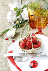 Table setting with strawberries