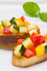 Bruschetta from zucchini and bell peppers