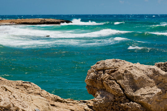 Waves in the sea near rocky coast