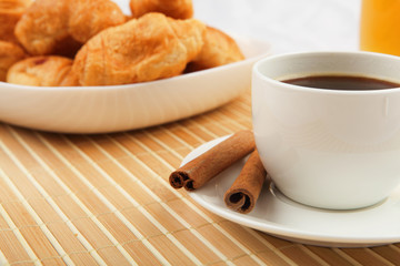 Breakfast coffee and croissants