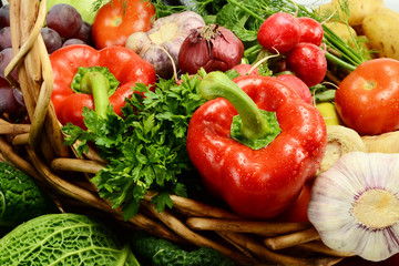 Raw vegetables and wicker basket
