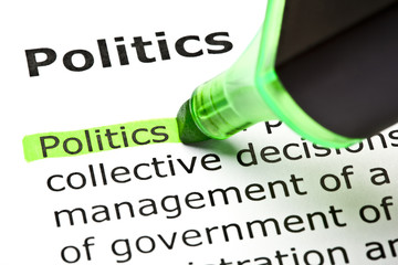 Fototapeta premium Dictionary definition of the word Politics highlighted in green