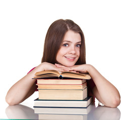 Teen girl with lot of books, isolated on white