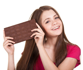 Shot of a beautiful teen girl holding big chocolate bar