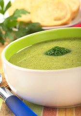 Cream of broccoli garnished with a broccoli floret