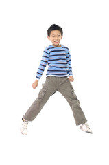 Happy little boy jumping in mid air isolated on white