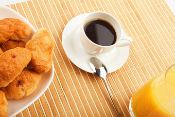 Breakfast coffee and croissants