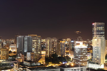 Fototapeta na wymiar Illuminated Skyscrapers at downtown Kuala Lumpur at night