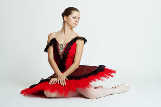 Beautiful ballerina sitting