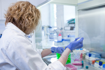 Fototapeta na wymiar female researcher doing research in a lab
