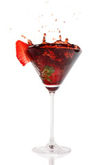 Splashing coctail drink, isolated on white background