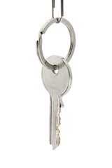 Single key hanging on a key ring over white