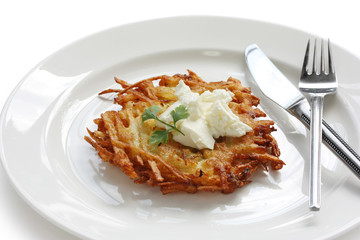 potato pancake with sour cream