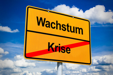 Ortsschild mit Wachstum und Krise