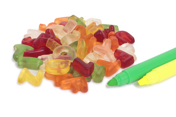 Colorful candy in the form of letters of the alphabet with marke
