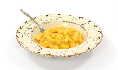 Cauliflower with cheese sauce in bowl with spoon