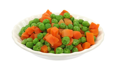 Peas and carrots in white dish