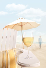 Glass of  wine on adirondack chair at the beach - 32548013