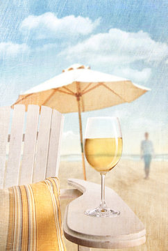 Glass Of  Wine On Adirondack Chair At The Beach