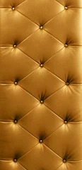 Foto op Plexiglas luxe gouden knop lederen achtergrond © SuriyaPhoto