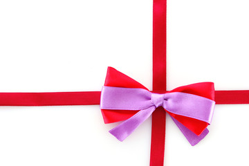 Gift red ribbon and bow isolated on white background