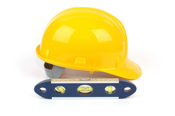 yellow industrial safety helmet and water level