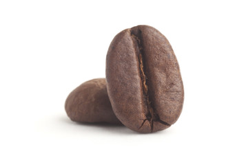 Coffee beans close up in isolated white background